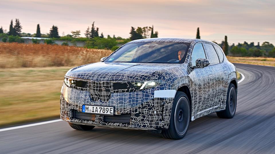 A camouflaged prototype of the iX3 full-electric SUV, which will be the first production Neue Klasse model.
