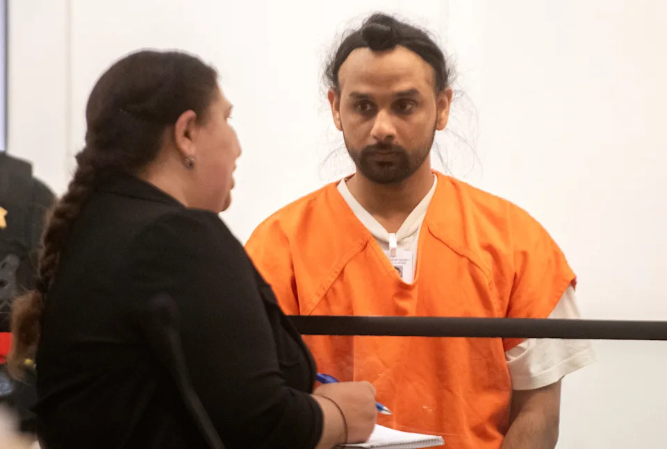 Harjinder Singh, right, listens to an interpreter translate the proceedings of his arraignment in Department 8C of the San Joaquin County courthouse in downtown Stockton on Aug. 19, 2025 on charges of killing 3 people while attempted an illegal U-turn on the Florida Turnpike near Fort Pierce, Florida.