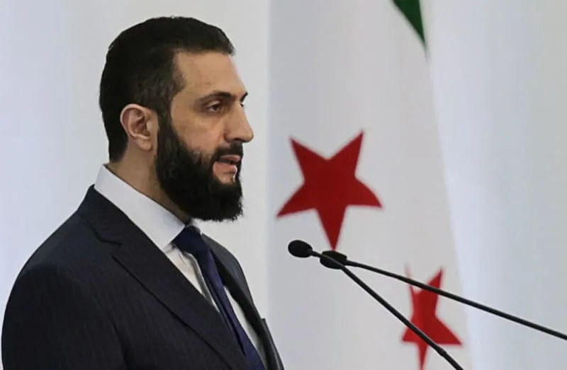 President Ahmed al-Shara'a speaks during the formation of the new Syrian government. March 29, 2025. (credit: REUTERS/KHALIL ASHAWI)