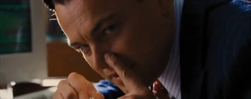 Leonardo DiCaprio as Jordan Belfort in the Wolf Of Wall Street