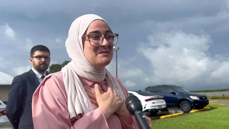 Rümeysa Öztürk speaks to members of the press and others gathered outside the Louisiana detention center where she was held. - KATC
