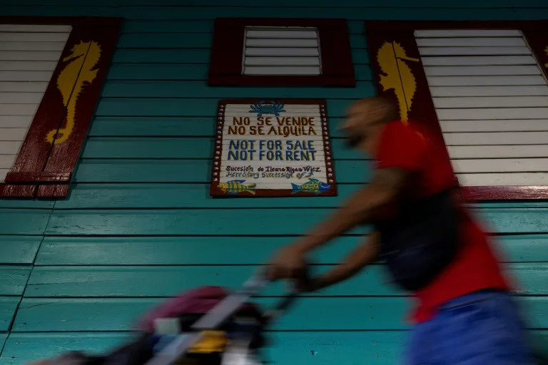 'Not for sale, not for rent,' reads a sign in Cabo Rojo, Puerto Rico, where a planned major development has many residents concerned over rapid gentrification and displacement (Ricardo ARDUENGO)