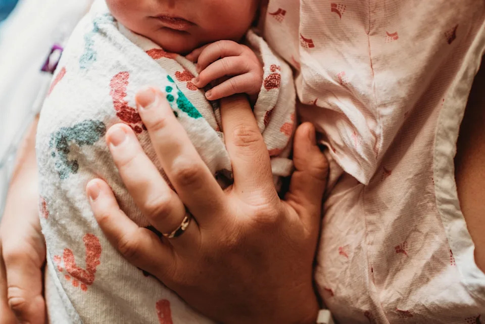 STOCK PHOTO/Getty Images - PHOTO: A mom holds a newborn baby in an undated stock photo.