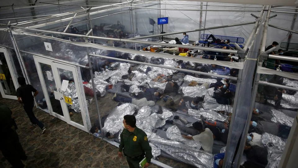 Children inside a pod at a holding facility run by the Customs and Border Patrol (CBP) on March 30, 2021 in Donna, Texas. - Dario Lopez-Mills/Pool/Getty Images