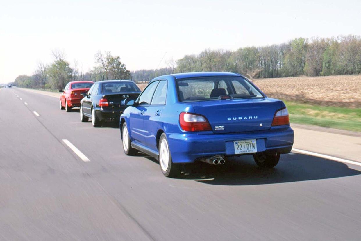 View Photos of the 2002 Subaru Impreza WRX, 2001 BMW 330xi, and Audi S4 Quattro