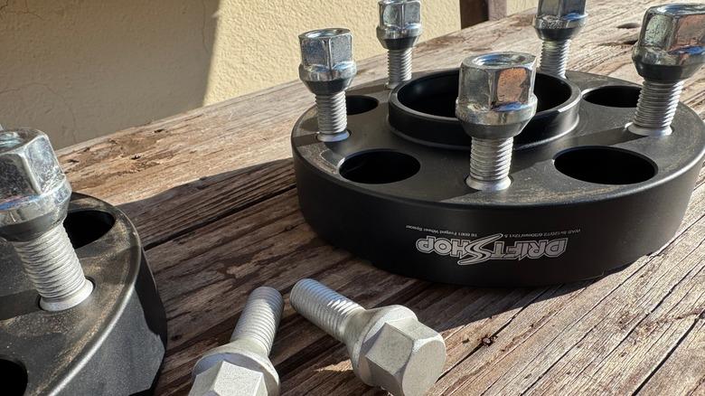 A close up image of a wheel spacer