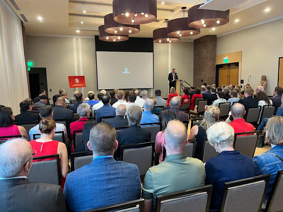 Gov. Larry Rhoden speaks in downtown Sioux Falls on Aug. 14, 2025, at the University of South Dakota's announcement that the state's only medical school will move to Sioux Falls. (Makenzie Huber/South Dakota Searchlight)