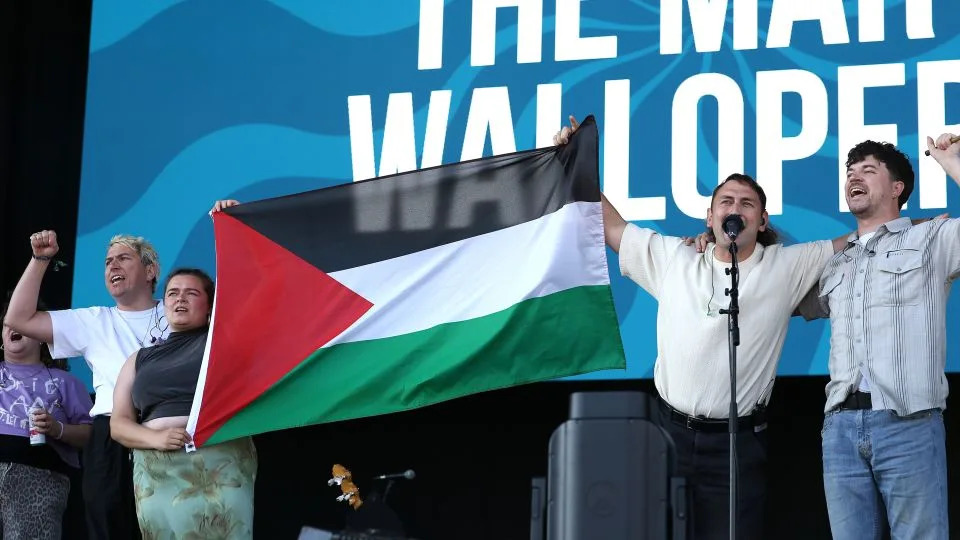 Irish folk band The Mary Wallopers say they were muted at festival for showing Palestinian flag on stage