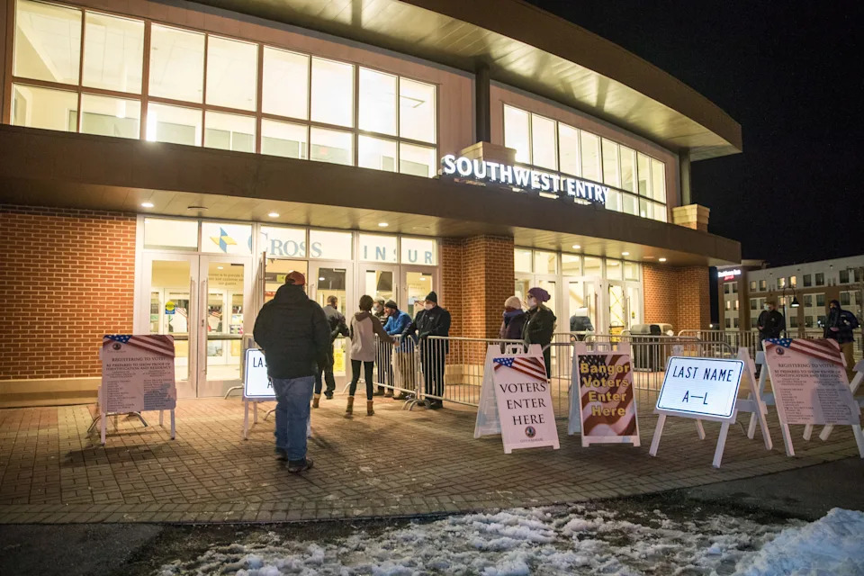 BANGOR, ME - NOVEMBER 03: Voters enter the Cross Insurance Center polling location during the last few hours of the election on November 3, 2020 in Bangor, Maine. After a record-breaking early voting turnout, Americans head to the polls on the last day to cast their vote for incumbent U.S. President Donald Trump or Democratic nominee Joe Biden in the 2020 presidential election.