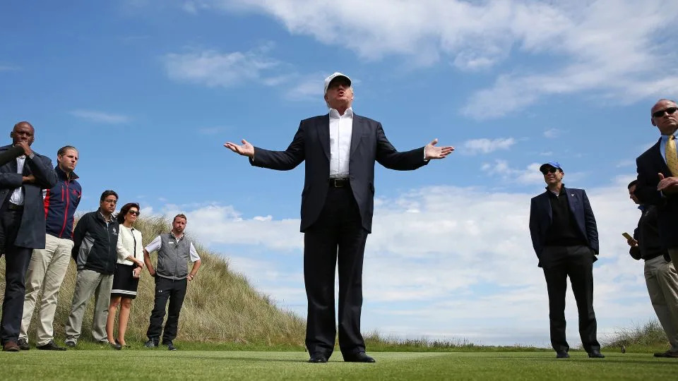 In this June 25, 2016 photo, Donald Trump speaks to the media on the golf course at his Trump International Golf Links in Aberdeen, Scotland. - Carlo Allegri/Reuters/File