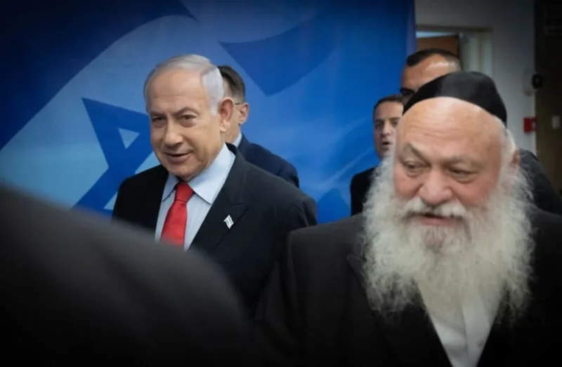 Prime Minister Benjamin Netanyahu and Construction and Housing Minister Yitzhak Goldknopf seen in Jerusalem, September 27, 2023 (credit: FLASH90/CHAIM GOLDBERG)