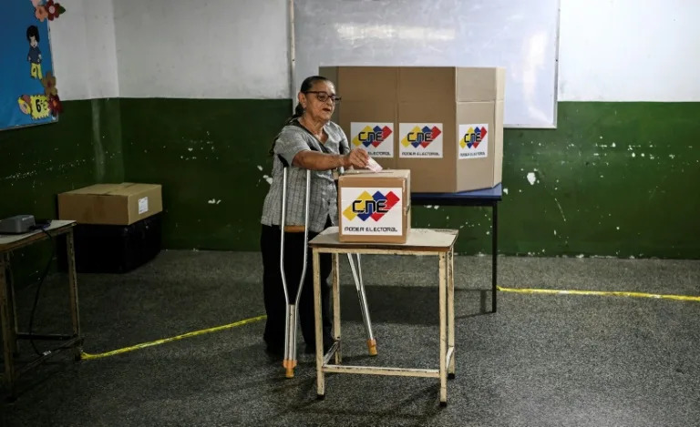 Venezuela's ruling party won the majority of mayoralties Sunday in elections boycotted by the main opposition, coinciding with the anniversary of President Nicolas Maduro's re-election (Juan BARRETO)