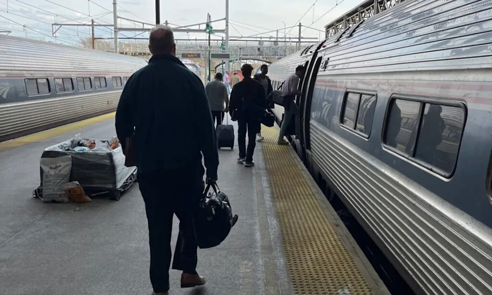 Passengers board an Amtrak train at Harrisburg’s station. (Capital-Star/Peter Hall)