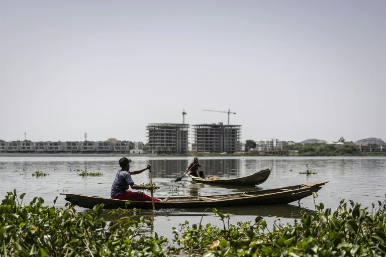 As Nigeria rapidly urbanises, passing down their craft has become both a cultural lifeline and economic lifeline for Abuja's fishermen (OLYMPIA DE MAISMONT)
