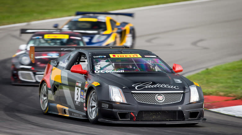 Driver Johnny O'Connell piloting his CTS-V racer at the 2014 Mid-Ohio event