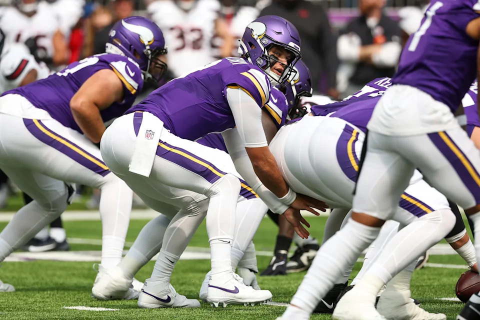 Minnesota Vikings quarterback J.J. McCarthy (9) prepares for a snap against the Houston Texans during the first half of an NFL preseason football game, Saturday, Aug. 9, 2025, in Minneapolis. (AP Photo/Matt Krohn)