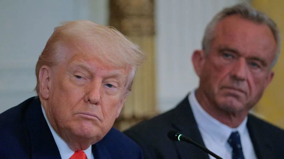 President Donald Trump and Health and Human Services Secretary Robert F. Kennedy Jr. attend an event introducing a new Make America Healthy Again Commission report in the East Room of the White House on May 22. - Chip Somodevilla/Getty Images/File