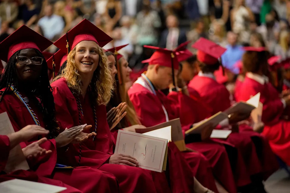 Graduating seniors sit down at the start of the Ravenwood High School class of 2023 commencement ceremony at the Curb Event Center in Nashville, Tenn., Saturday, May 27, 2023.
