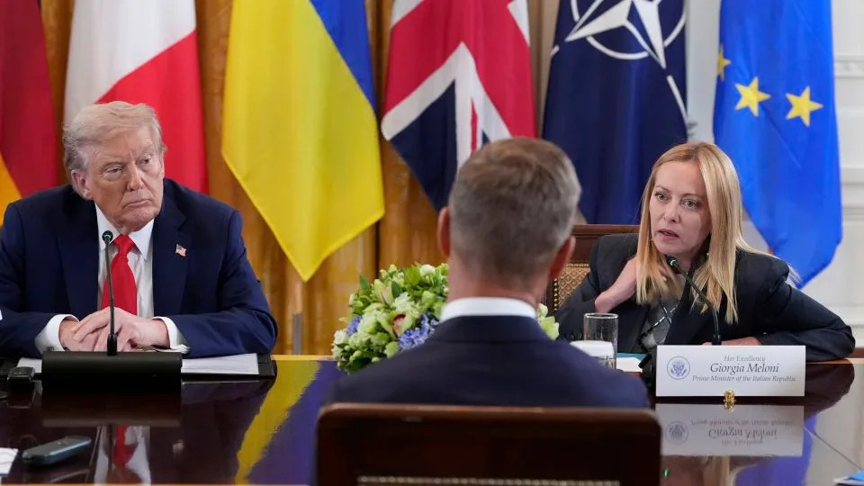 Italian Prime Minister Giorgia Meloni speaks as President Donald Trump listens during a meeting with Ukrainian President Volodymyr Zelenskyy and European leaders on Monday in Washington, DC. - Alex Brandon/AP