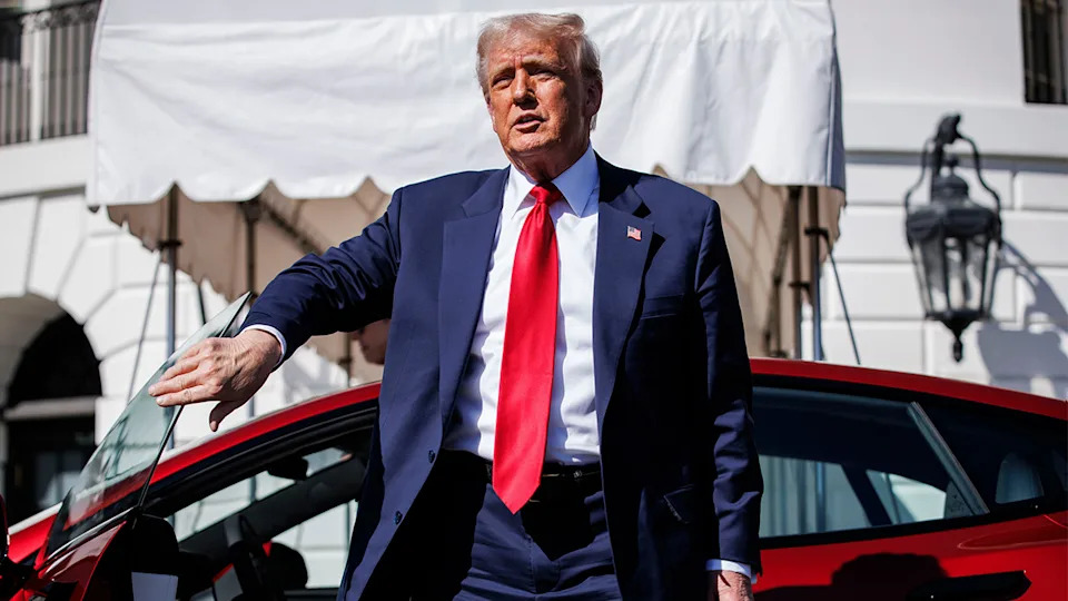 President Trump with a Tesla