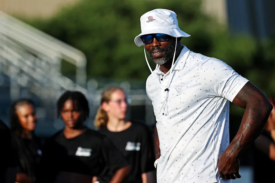 Former NFL star and four-time Pro Bowler Michael Vick looks on during the Second Annual Girls on the Gridiron Flag Football Clinic at Dick Price Stadium in Norfolk, Virginia, July 21, 2024. (Peter Casey/The Virginian-Pilot/Tribune News Service via Getty Images)