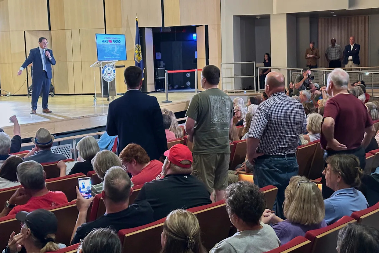 Nebraska congressman Flood gets an earful over Trump's tax cut law in raucous town hall