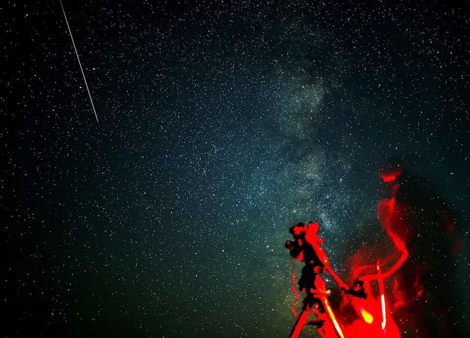 Astronomers observe the northern skies Aug. 12, 2024 during the Perseid meteor shower in Kozjak, North Macedonia.