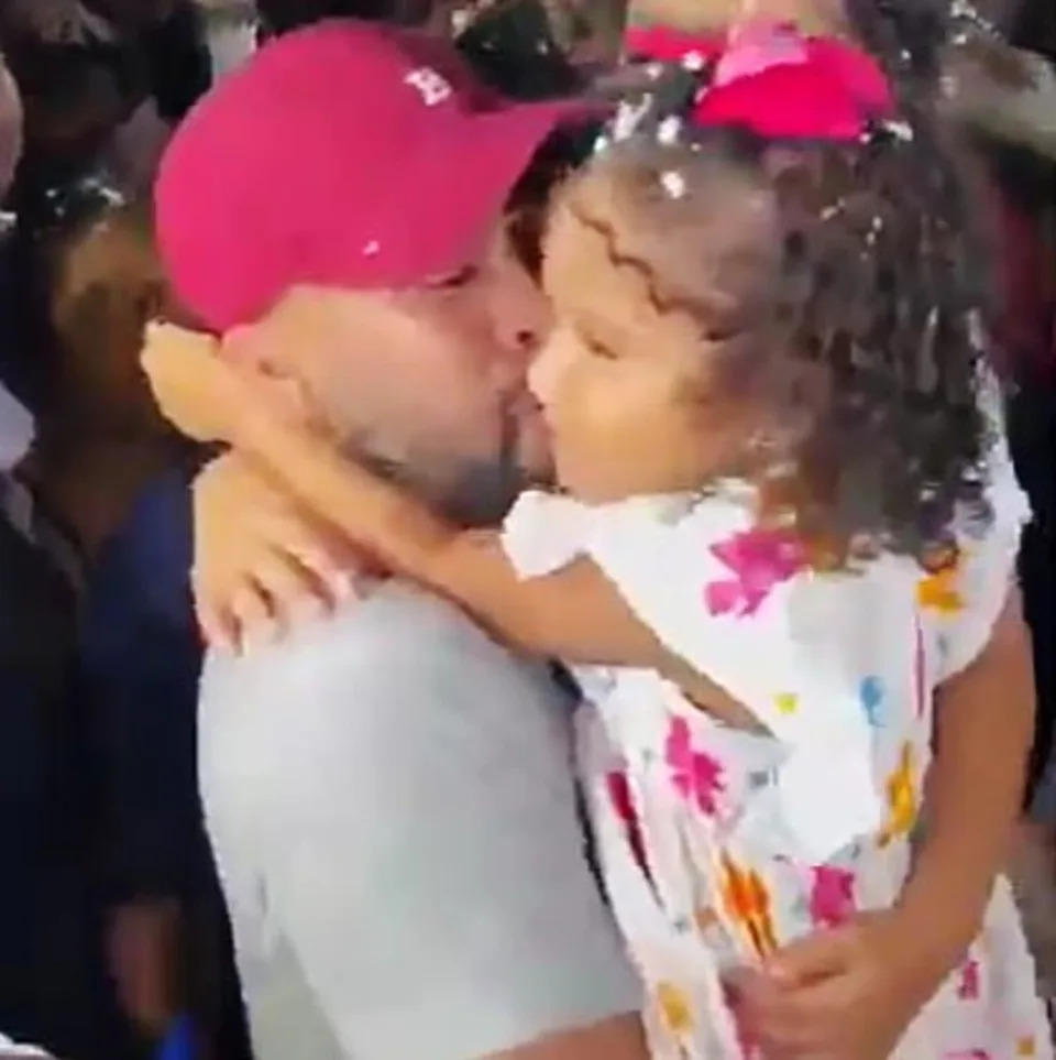 Jerce Reyes is reunited with family members in Venezuela after spending four months in prison in El Salvador. (Yogerse Viloria)