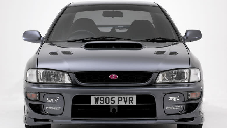 2000 Subaru Impreza with pink STI badge