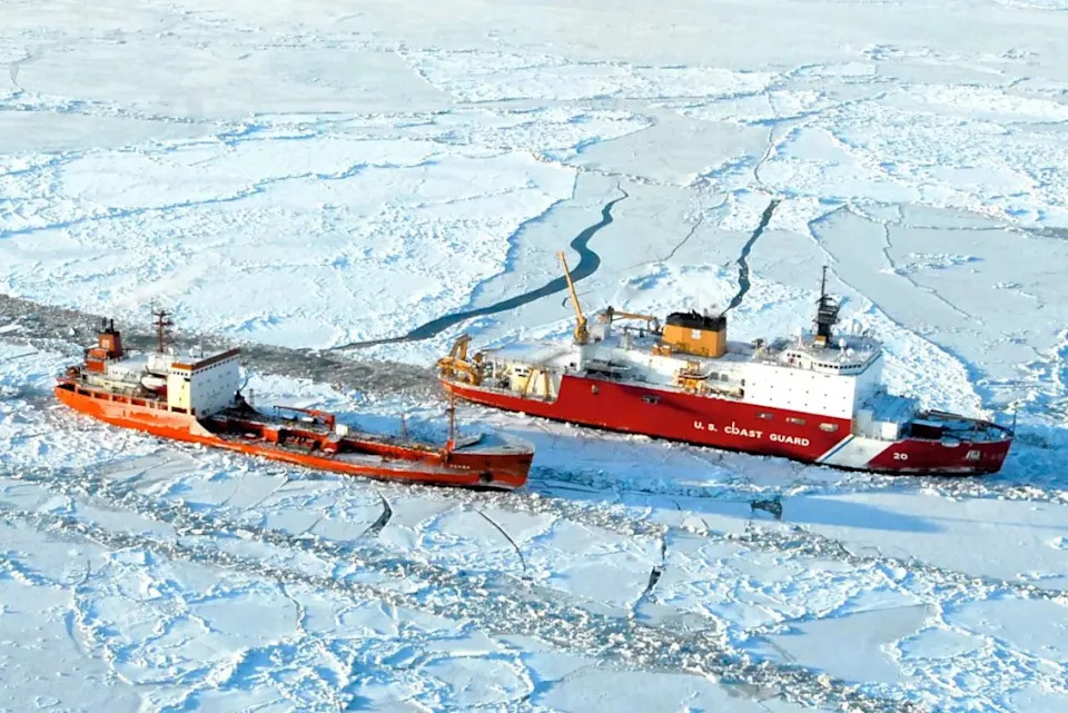 The USCGC Healy helps free a Russian-flagged tanker from the ice near Alaska in 2012. USCG