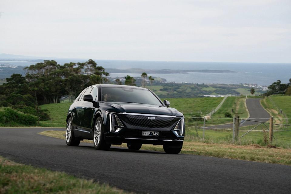 2025 cadillac lyriq in australian right hand drive trim on coastal road