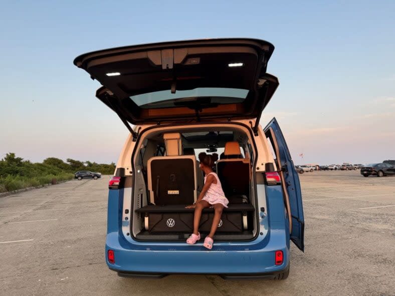 My 5-year-old standing in the back of the 2025 VW. ID Buzz