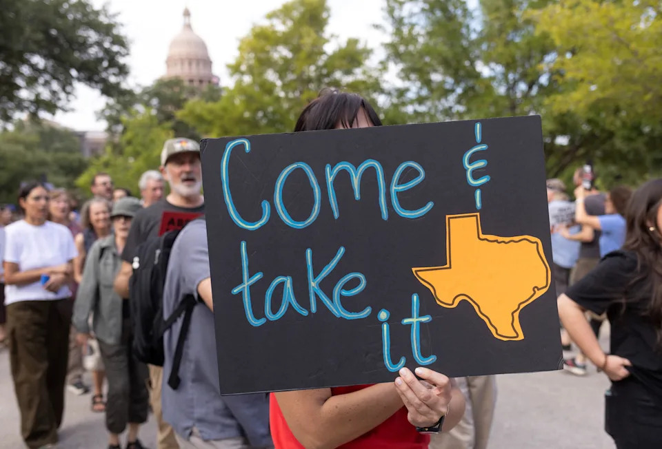 Protesters march against redistricting efforts in front of the Governor’s Mansion after Democratic lawmakers in Texas left the state to deny Republicans the quorum needed to redraw the state's 38 congressional districts, in Austin, Texas, U.S., August 4, 2025.