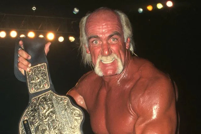 WWE/WWE via Getty Hulk Hogan poses with the World Heavyweight Championship Title during WCW Monday Nitro in 1999