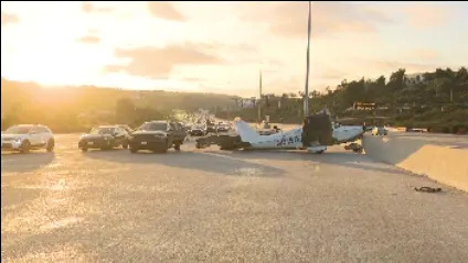Small plane lands in middle of San Diego highway (FOX 5/KUSI)