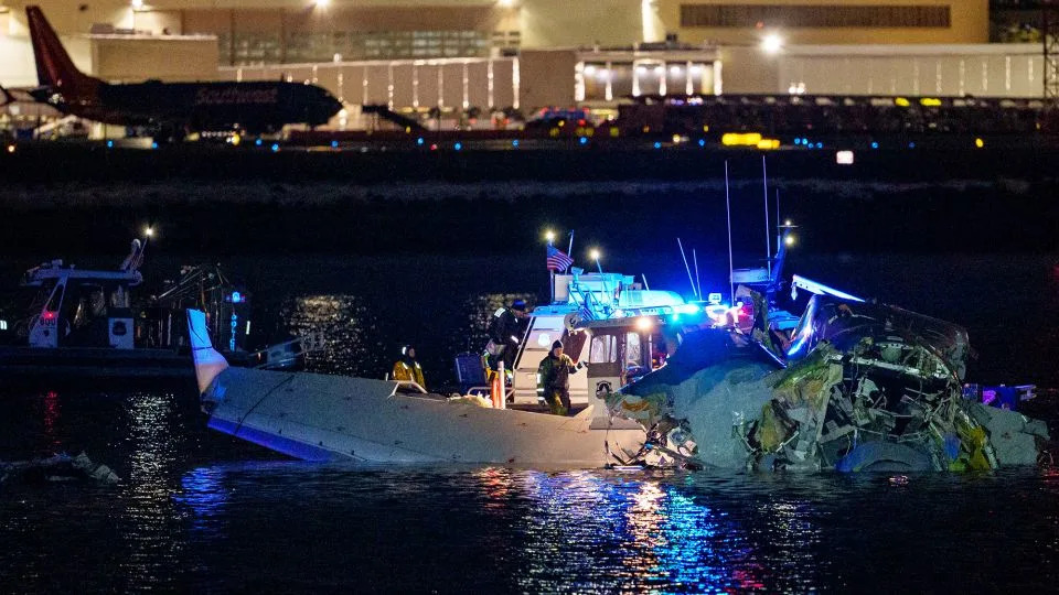 Emergency response units assess airplane wreckage in the Potomac River near Ronald Reagan Washington Airport on January 30 in Arlington, Virginia. - Andrew Harnik/Getty Images