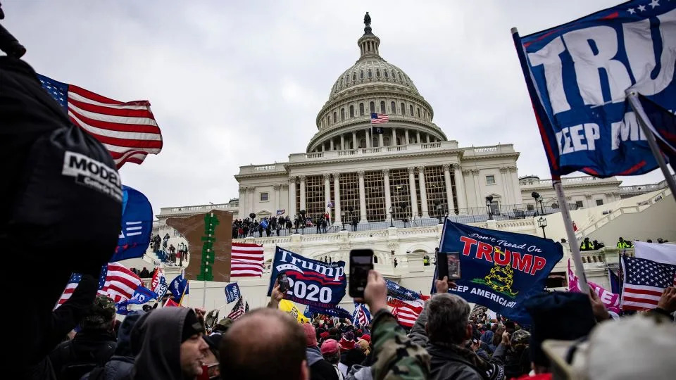 Trump supporters storm the US Capitol following a rally with President Donald Trump on January 6, 2021, in Washington, DC. - Samuel Corum/Getty Images