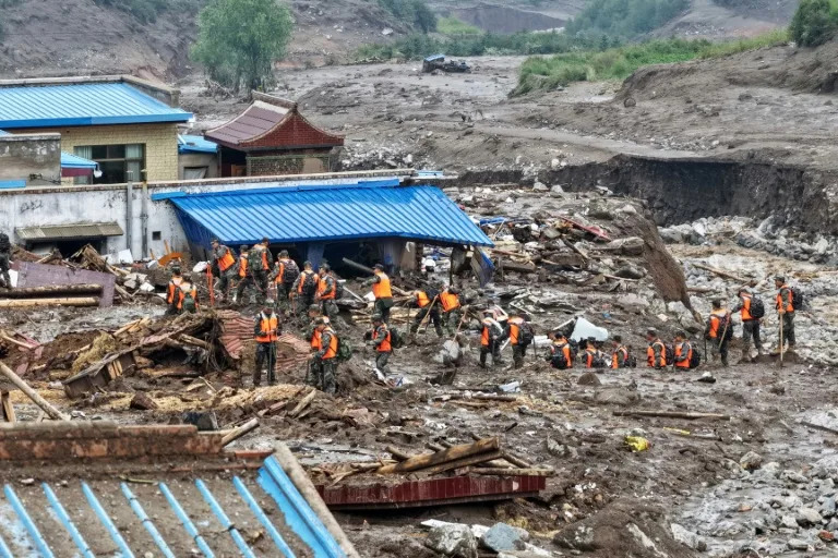 Death toll from northwest China floods rises to 13