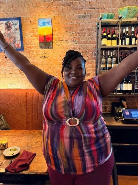 Sister Dee Dee celebrates her art work and her new life. (Photo by Alan Johnson for the Ohio Capital Journal.)