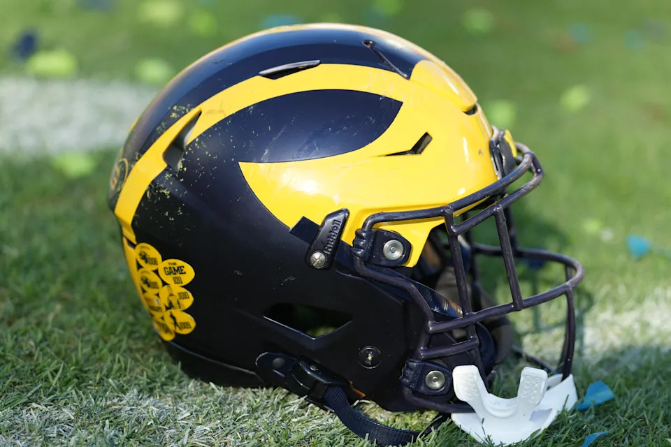 TAMPA, FL - DECEMBER 31: a Michigan Wolverines helmet rests near the sidelines during the ReliaQuest Bowl game between the Michigan Wolverines and the Alabama Crimson Tide on Tuesday, December 31, 2024 at Raymond James Stadium in Tampa, Fla. (Photo by Peter Joneleit/Icon Sportswire via Getty Images)