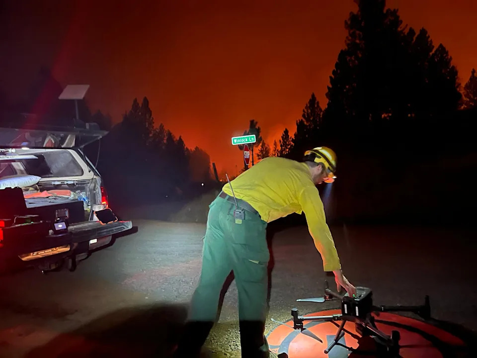 Eli Polsky, owner of Rogue Reconnaissance and a contractor for the Oregon Department of Forestry, powers up a drone during the Fossil Complex Fire in September 2024. ODF uses drones for things like detecting heat at night as well as mapping fire lines and hot spots during wildfires.