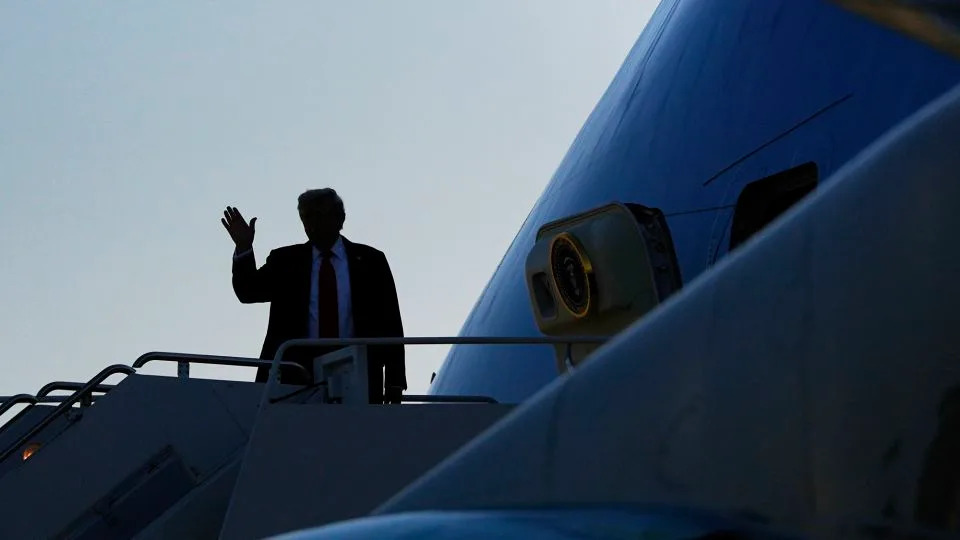 President Donald Trump waves as he boards Air Force One, Friday, Aug. 15, 2025, at Joint Base Andrews, Md. President Trump is traveling to a meeting with Russian President Vladimir Putin today in Alaska at a U.S. military base for a crucial summit. (AP Photo/Julia Demaree Nikhinson) - Julia Demaree Nikhinson/AP