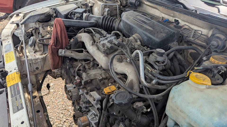 1998 subaru legacy outback wagon with 500k miles in colorado junkyard