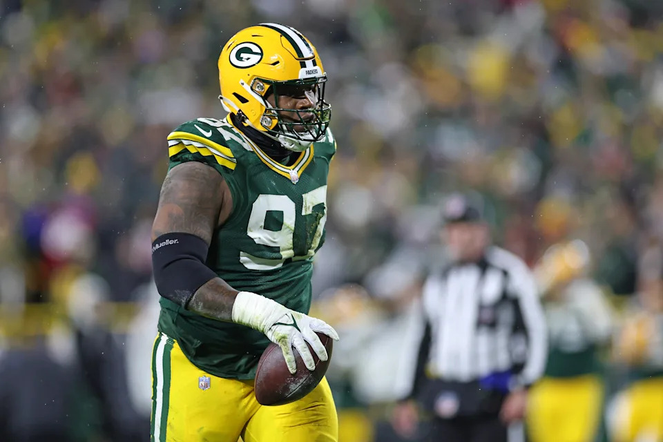 GREEN BAY, WISCONSIN - NOVEMBER 24: Kenny Clark #97 of the Green Bay Packers celebrates a turnover during a game against the San Francisco 49ers at Lambeau Field on November 24, 2024 in Green Bay, Wisconsin.  The Packers defeated the 49'ers 38-10. (Photo by Stacy Revere/Getty Images)
