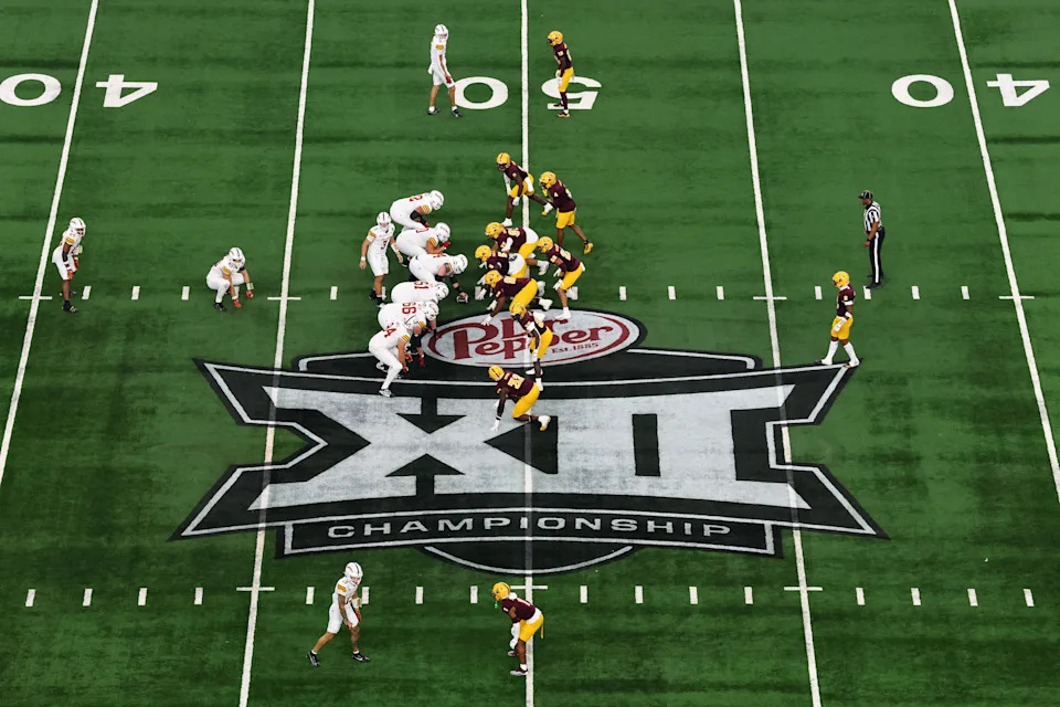 ARLINGTON, TEXAS - DECEMBER 7: The Iowa State Cyclones offensive line lines up across the Arizona State Sun Devils defensive line at the line of scrimmage over the Dr. Pepper Big 12 Championship logo at midfield during the first half of the Big 12 Championship game at AT&T Stadium on December 7, 2024 in Arlington, Texas. (Photo by Aaron M. Sprecher/Getty Images)
