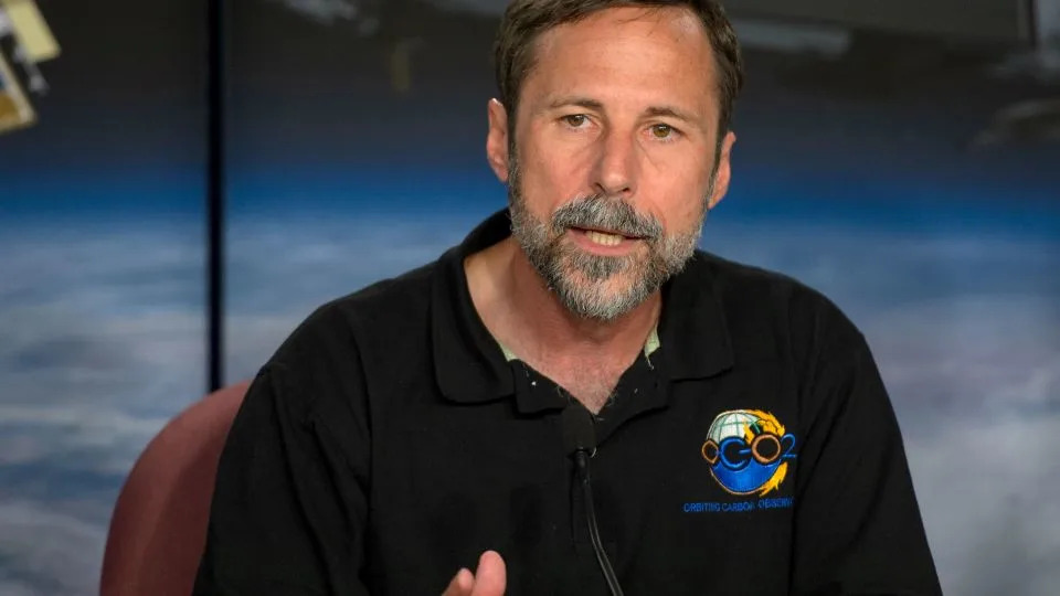 Dave Crisp speaks during an Orbiting Carbon Observatory-2 briefing in June 2014. - NASA/Bill Ingalls