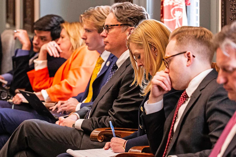 Attendees listen as lawmakers in Delaware's Senate Judiciary Committee debate changes to Delaware's corporate law at Legislative Hall in Dover, Wednesday, March 12, 2025. The Delaware's corporate law is the code that sets corporate governance for many of the nation's largest companies.