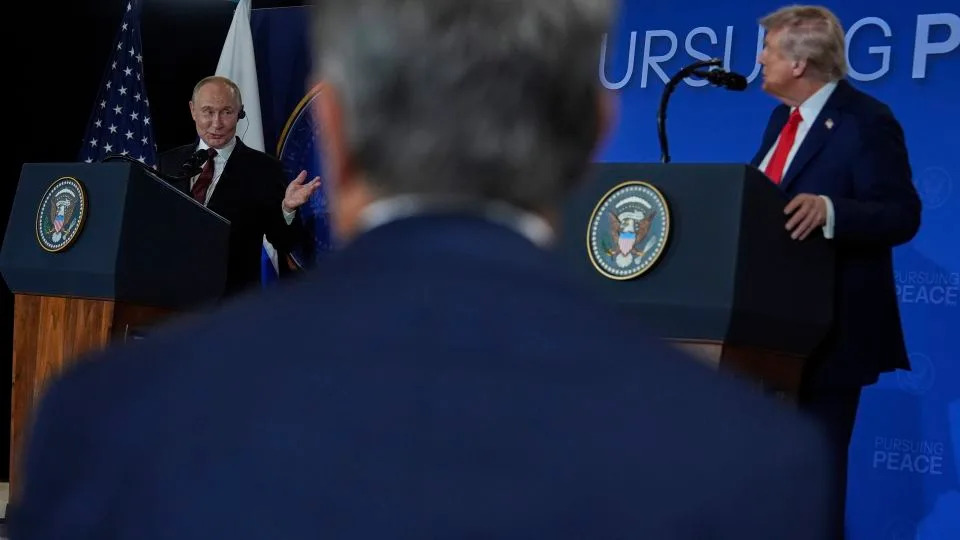 President Donald Trump listens as Russia's President Vladimir Putin speaks during a news conference at Joint Base Elmendorf-Richardson, Alaska, on Friday, August 15, 2025. - Julia Demaree Nikhinson/AP