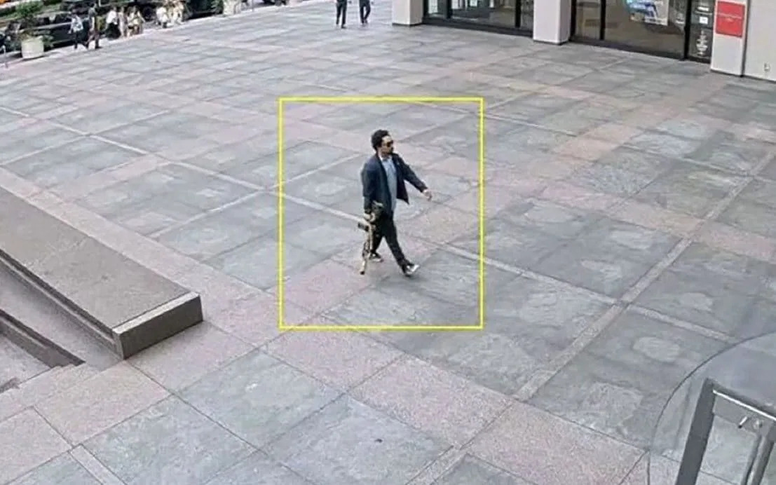 Police released a photo of the gunman entering the building with a rifle