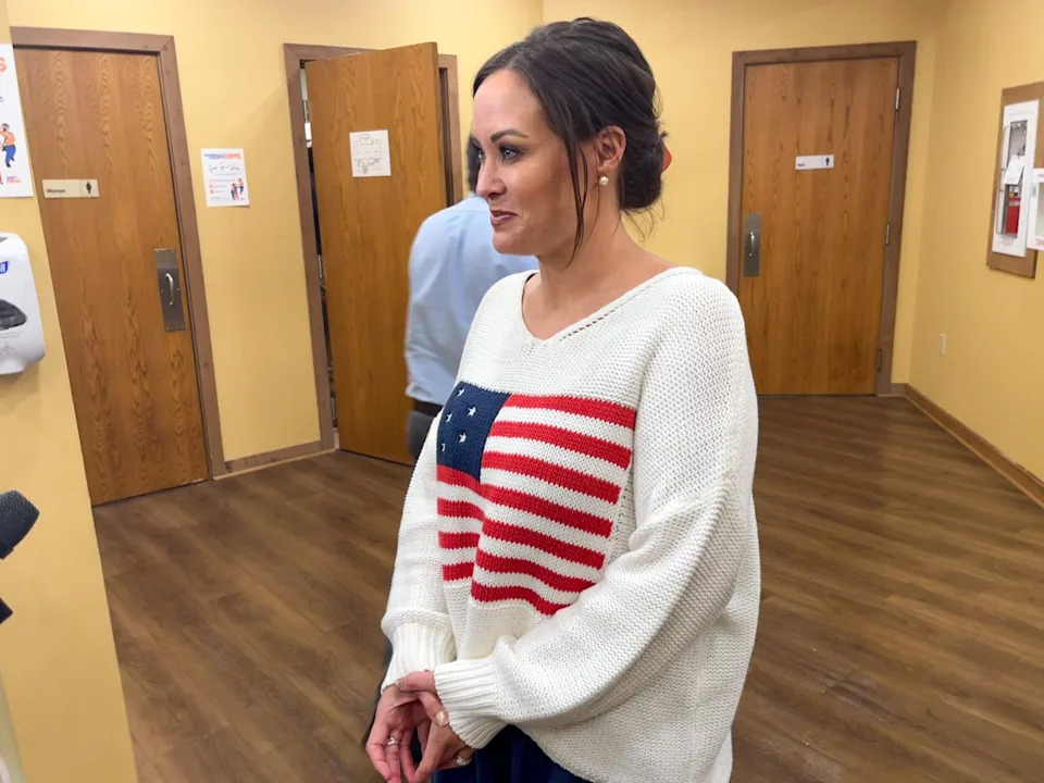  Lt. Gov. Jacqueline Coleman talks with reporters after speaking at the Marshall County Democrats’ annual bean dinner. (Kentucky Lantern photo by McKenna Horsley)